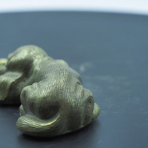 Vintage Solid Brass Lying Dog Figurine: Relaxed Sculpture