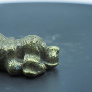 Vintage Solid Brass Lying Dog Figurine: Relaxed Sculpture