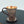Handhamrad mugg med blomsteraccent och fat